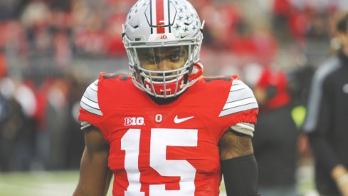 Ezekiel Elliott strolls the sidelines vs. Michigan State.