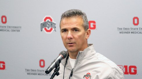 Urban Meyer speaking to the media.