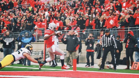 J.T. Barrett hits a lick.