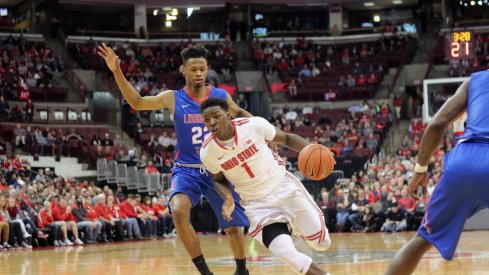 Jae'Sean Tate drives down the lane. 