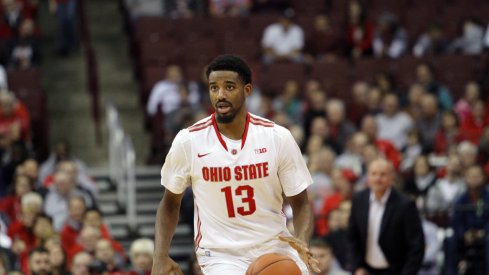 JaQuan Lyle brings the ball up the floor. 