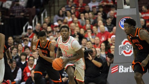 Jae'Sean Tate drives down the floor.