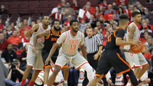 JaQuan Lyle defends against Mercer.