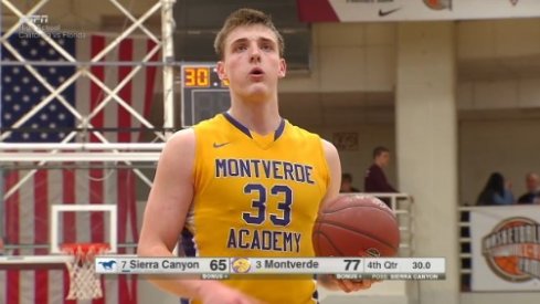 Micah Potter lines up for a free throw.