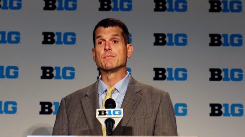 Jim Harbaugh is taking roster management to a whole new level in the Big Ten.