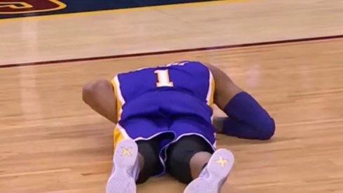 D'Angelo Russell on the floor after getting hit by a pass from LeBron James.