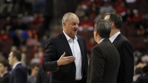 Thad Matta talks to the Northwestern staff.