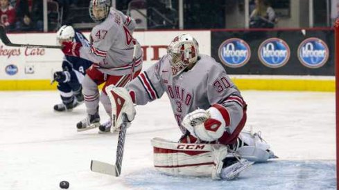 Josh Healey looks on as Christian Frey makes a save for Ohio State against Penn State