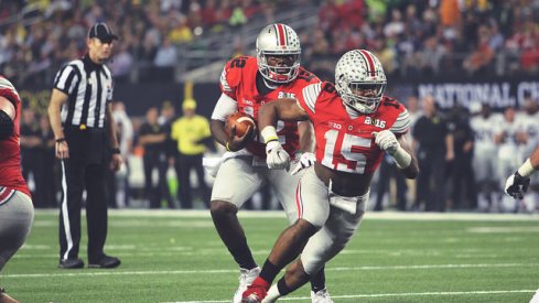 Ezekiel Elliott leads the way for Cardale Jones.