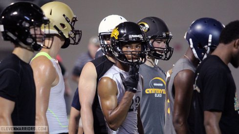 High school football players at one of Ohio State's position camps last summer.