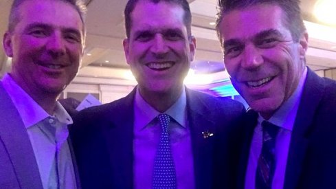 Jim Harbaugh and Urban Meyer posed for a selfie Friday night with Chris Fowler.