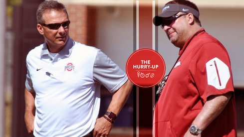 Urban Meyer and Bret Bielema at today's MCAOFGA Satellite Camp