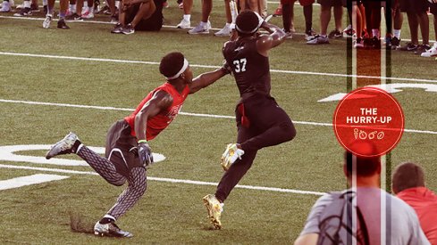 Tyjon Lindsey, right, attempts to haul in a pass at Friday Night Lights.