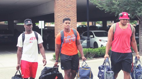 Jerome Baker, Dre'Mont Jones and Branden Bowen check into fall camp last year. 