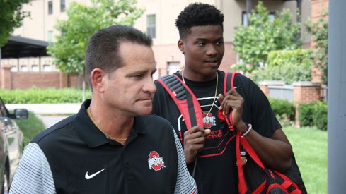 Tim Beck, left, and Dwayne Haskins