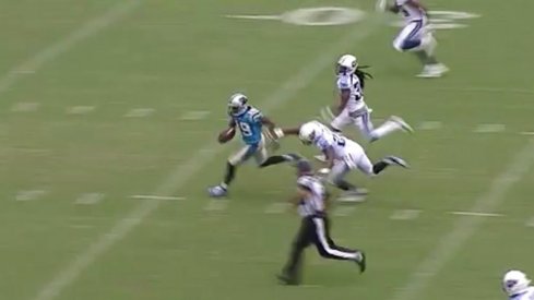 Ted Ginn Jr. races past Tennessee Titan defenders for a 61-yard touchdown catch and run.