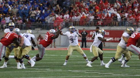 Ohio State's Tyquan Lewis forces a fumble against Tulsa. 