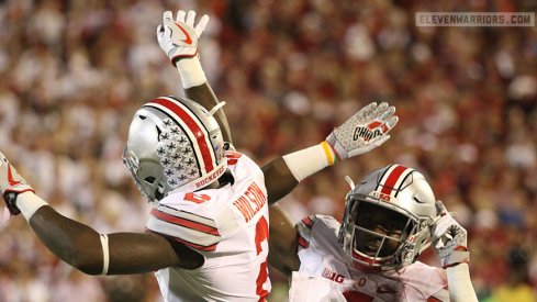 Ohio State's Dontre Wilson, Curtis Samuel celebrate a touchdown. 