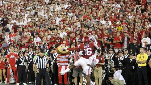 Noah Brown snags an insane catch against Oklahoma. 