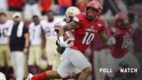 Sep 17, 2016; Louisville, KY, USA; Louisville Cardinals cornerback Jaire Alexander (10) looks back as he runs in a punt return for a touchdown against the Florida State Seminoles during the second half at Papa John's Cardinal Stadium. Louisville defeated Florida State 63-20. Mandatory Credit: Jamie Rhodes-USA TODAY Sports