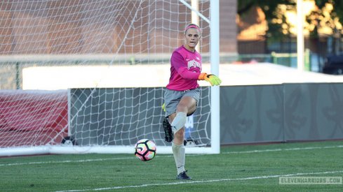 Jillian McVicker kicks a goal kick.