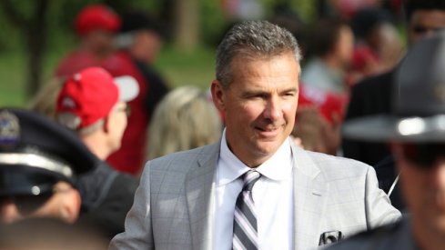 Urban Meyer on a pregame strut.