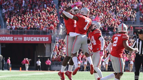 Ohio State's defense celebrates a first-half turnover.