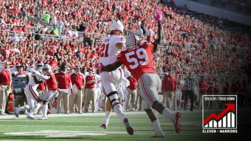 Ohio State's Tyquan Lewis forces a fumble. 