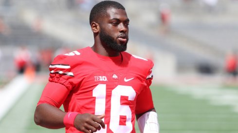 Ohio State quarterback J.T. Barrett warms up. 