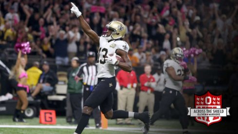 Michael Thomas scores a touchdown play.