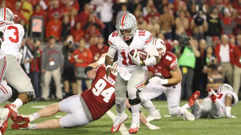 J.T. Barrett runs the ball against Wisconsin.