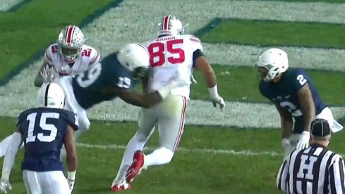 Marcus Baugh scores against Penn State.