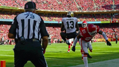 Michael Thomas makes a circus catch against the Saints.