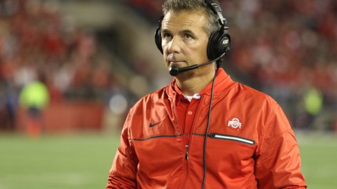 Ohio State coach Urban Meyer strolls the sidelines at Wisconsin. 