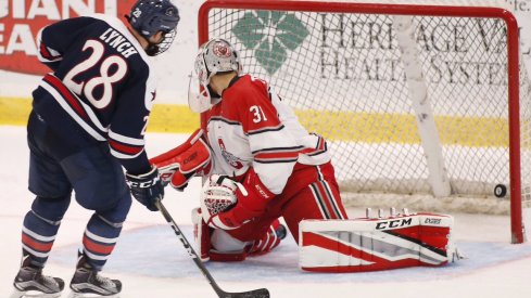 Robert Morris' Luke Lynch scores against Ohio State goalie Matt Tomkins.