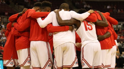 Ohio State huddles before its exhibition against Walsh. 