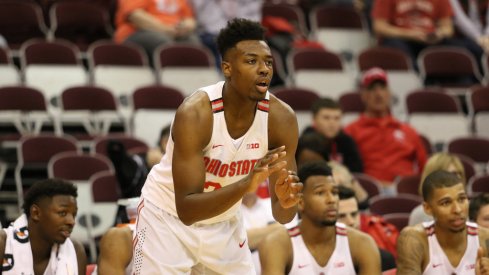 Ohio State freshman Andre Wesson prepares to catch a pass.