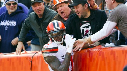 Terrelle Pryor celebrates a touchdown with Cleveland Browns fans.