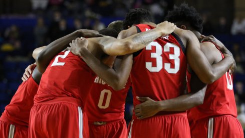 Ohio State huddles prior to taking on Navy on Friday.