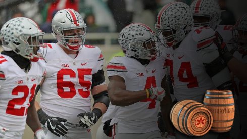 Curtis Samuel is congratulated by The Slobs for a touchdown in East Lansing