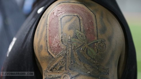 Ohio State linebacker Raekwon McMillan displays his new tattoo Wednesday at the WHAC.