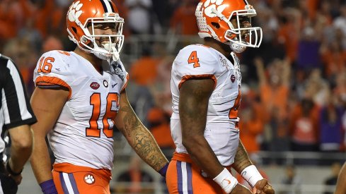 Dec 3, 2016; Orlando, FL, USA; Clemson Tigers quarterback Deshaun Watson (4) celebrates after scoring a touchdown against the Virginia Tech Hokies during the second half of the ACC Championship college football game at Camping World Stadium. The Clemson Tigers defeat the Virginia Tech Hokies 42-35. Mandatory Credit: Jasen Vinlove-USA TODAY Sports