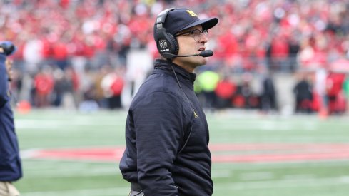 Michigan coach Jim Harbaugh on the sidelines at Ohio Stadium. 