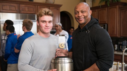 Eddie George surprises Tate Martell with Gatorade Player of the Year Award.