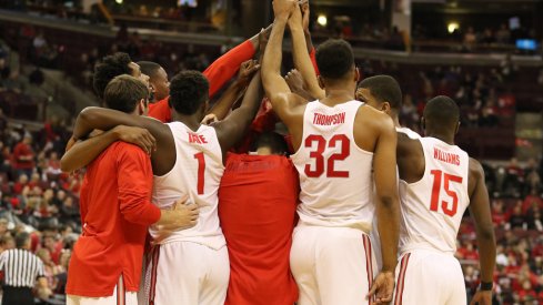 Ohio State huddles before playing UConn. 