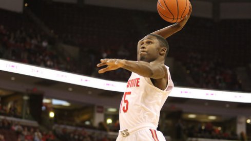 Ohio State guard Kam Williams slams the dunk home.