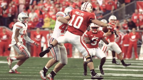 Ohio State linebacker Zach Boren makes a fumble against Wisconsin.