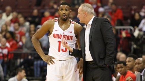 Ohio State's JaQuan Lyle and Thad Matta have a conversation.