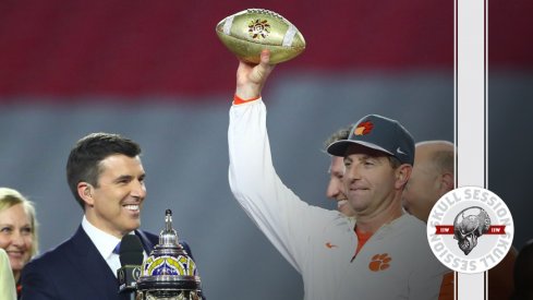 Dabo Swinney lifts the January 2nd 2016 Skull Session over his head.