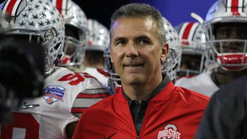 Urban Meyer prepares to lead his team on the field for the Fiesta Bowl. 